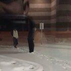 This guy being a husband of the year clearing the snow for his wife