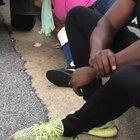 Woman sucking on tailpipe