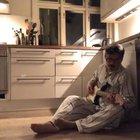 Singing a nice love song in the evening kitchen