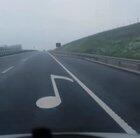 These raised pavement markers are producing music, but only if you drive within the speed limit