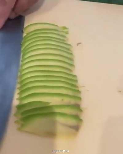 Slicing an avocado for some sushi