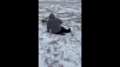 WCGW showing your dog snow next to a hill