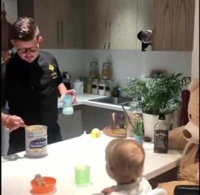 A professional bartender father serves breakfast in style for his toddler son