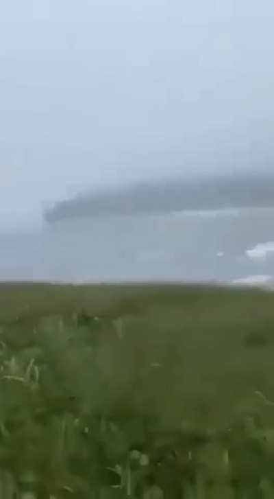 This Tsunami video has not been picked up by any news orgs, and I can find zero information ANYWHERE about this, so I assume it's fake. However, Bays in Tsunamis are wild, Russia did get hit by waves pretty bad, and water seemingly behaves normally. It is