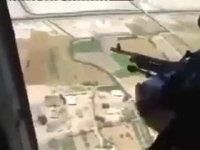 Iraqi door gunners raining bullets on isis territory while the helicopter bomb their positions, Jurf Al Sakhar-2015.