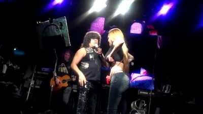 Blonde showing off tits and ass onstage