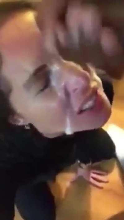 Milf lets black guy cum all over her face