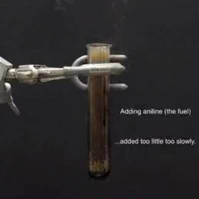 Adding aniline to nitric acid to make rocket propellant