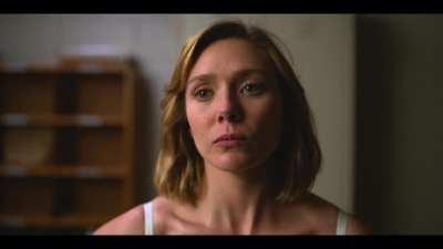 Elizabeth Olsen stripping for you.