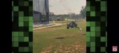 Anyone can catch ONE football mid-backflip