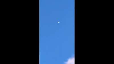 UFO spotted in 2 different countries (2 video recordings)