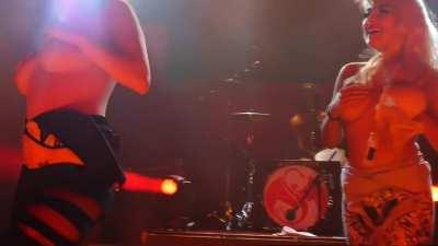 Squirting milk at a concert 