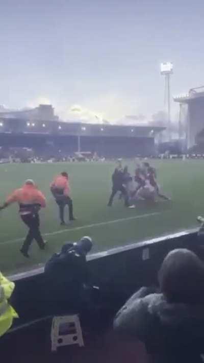 Leicester fan runs on to the pitch and attacks Forest players as they celebrate their third goal