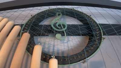 Drumroll: I built this kinetic sculpture for a local music studio. It is approximately 8' long and uses 72 drumsticks to create a moving sine wave.