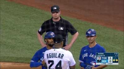 [Highlight] First base umpire Ryan Wills calls Marcus Semien out even though the first base defender is several feet off the bag. The other umpires meet and overturn his call without even going to review. This is the third call of the game Wills has had o
