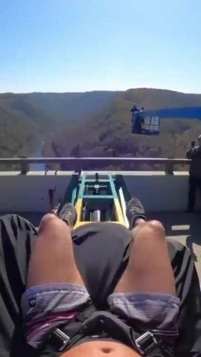 Person catapults from really high into a body of water