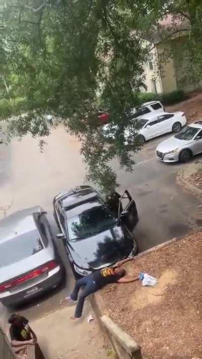 female cop almost getting ran over by her own car