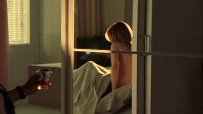 Michelle Monaghan strips out of her little Santa dress in Kiss Kiss Bang Bang. 2005