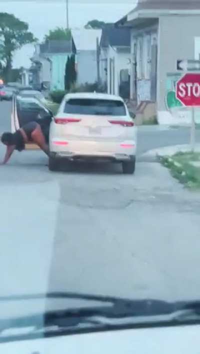 Woman twerks on the street