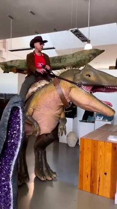 This T-rex model looks like the guy is riding it, also with some interesting head maneuvers