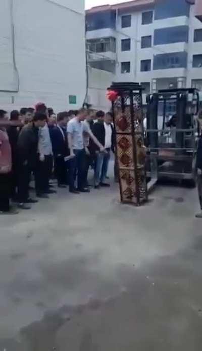 Forklift snaps an object out of the ground and destroys an observer
