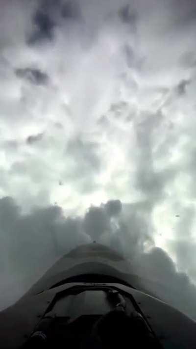 Jet fighter pilot enjoys some unusual clouds in a cool bit of aerobatics