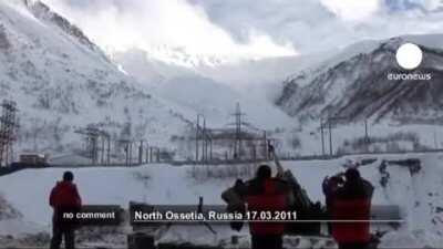 Creatting avalanche by firing artillery