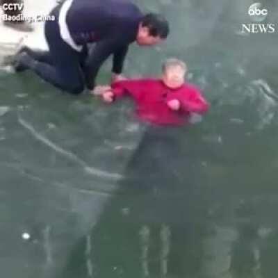 He saves an old woman from ice river