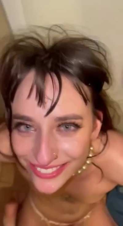 The smile on my daughter's face while I fuck her throat only makes me use her harder