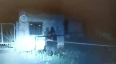A video out of Opishnya, Ukraine shows the moment a police sniper shoots a wanted terrorist that is holding both a live grenade and a hostage. The sniper drops the terrorist, allowing the hostage to frantically escape and the grenade goes off.