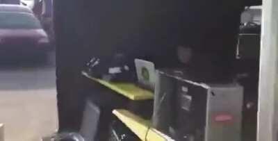 Stunt cameraman dives through car to get the shot