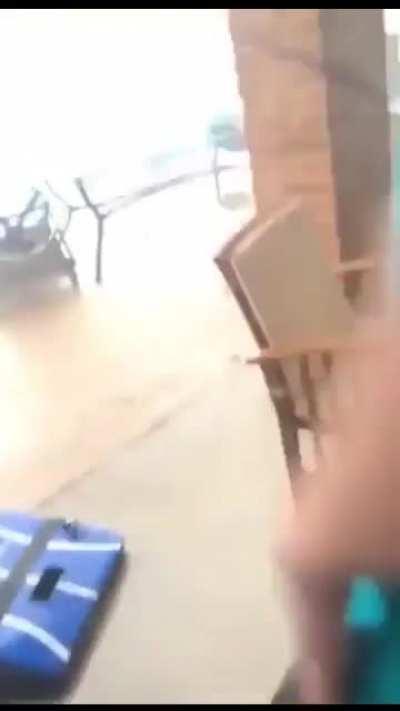 On second thought he decides to stay inside.