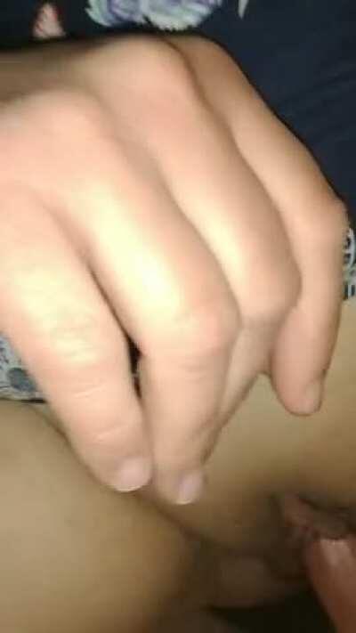 Fingering the wife and admiring her tits.