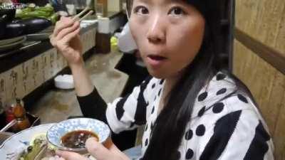 Live frog sashimi. They prop the frog up, and it watches you while you eat it.