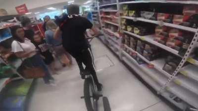Disrespectful Teens on Bikes Cause Havoc riding through an ASDA Supermarket.