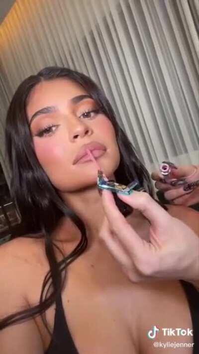 Kylie showing her boobs off