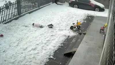 Waterfall of snow while cleaning it up