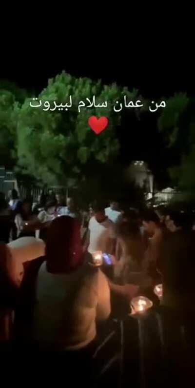 People in Jordan lighting candles infront of the labenese embassy in amman ( video)