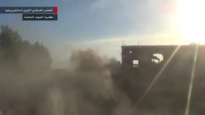 Close range technical work during a skirmish between the FSA & SAA in Otaybah, Ghouta - 2013
