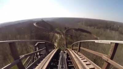 Michael Gira rides a rollercoaster