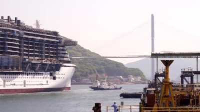 A cruise ship being built from the keel all the way till the bridge by Mitsubishi Heavy Industries in Nagasaki, Japan
