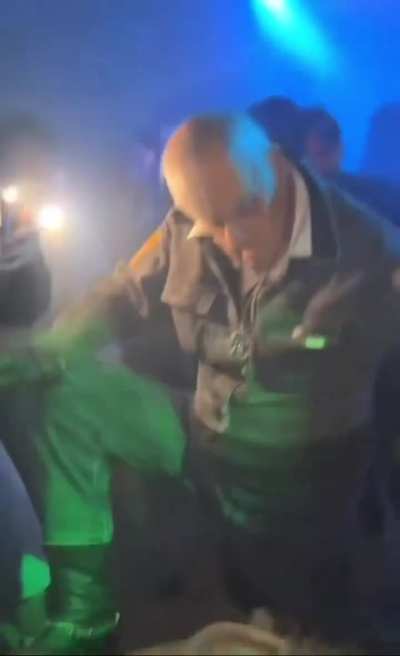 A man named The Cowboy of Trois Riviere, having a blast at the club.