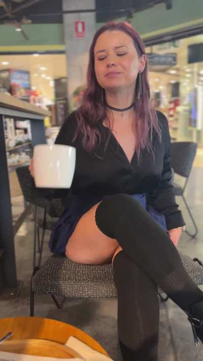 Showing others nothing is under while having coffee