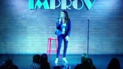 Timing of comedian fainting after making jokes about about being vaxxed, boosted how much Jesus loves her is so perfect, audience thinks it's part of the act
