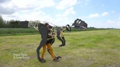 Mechanical dinosaur suit