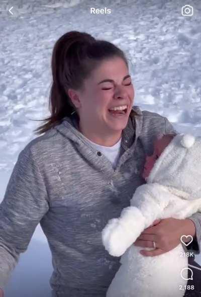 Stepmom and baby out for a slide