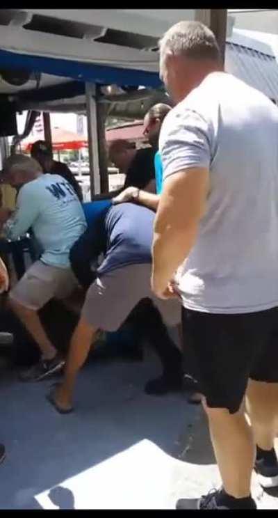 Racist POS slaps woman, gets choked out