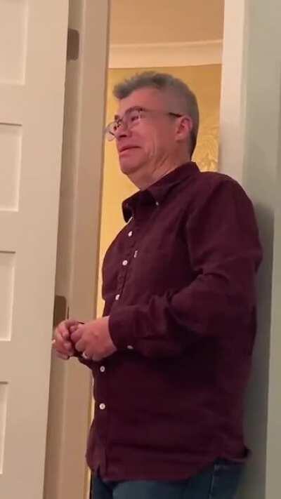Dad's reaction to seeing his daughter in her wedding dress.