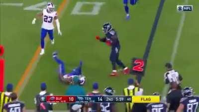 Derrick Henry shoves a DB into the turf with a strong stiff arm