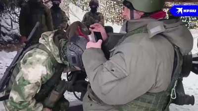 RU POV: Priest Sergius Rysev and Deacon Maxim Zubritsky visited Russia's 1st Tank Army artillery brigade. At a D-30 howitzer position, they held a prayer service for victory, performed confessions, and administered communion.